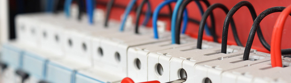 Close-up of circuit breakers and wiring in a switchboard